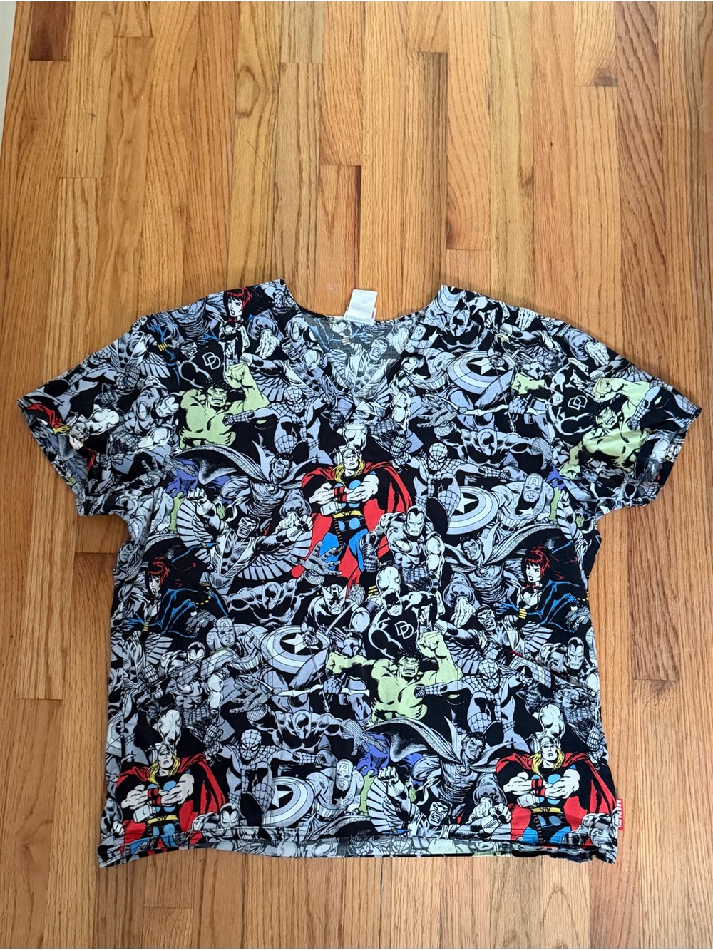 Marvel Black All-Over Superhero Graphic Tee with Red and Yellow Accents